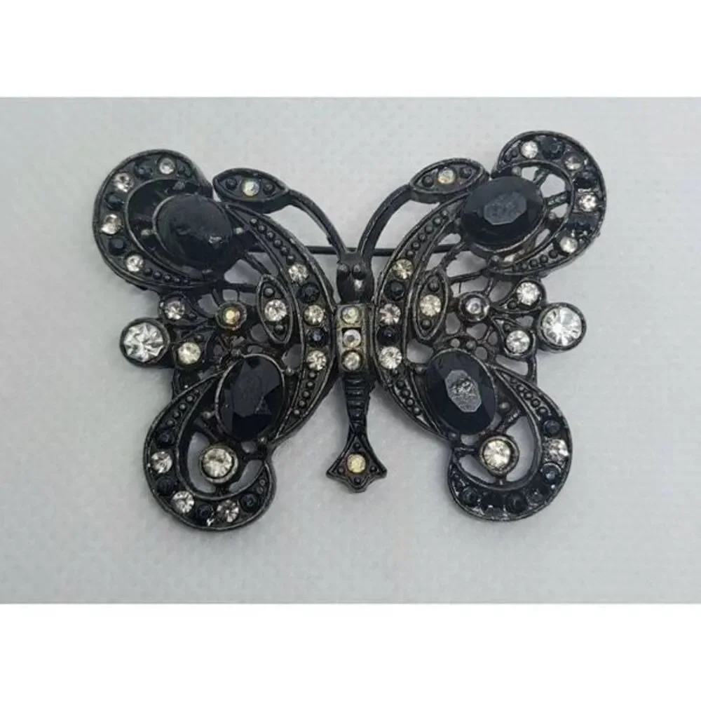 AAI butterfly brooch